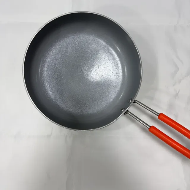 After re-coating: the same utensil as it went back